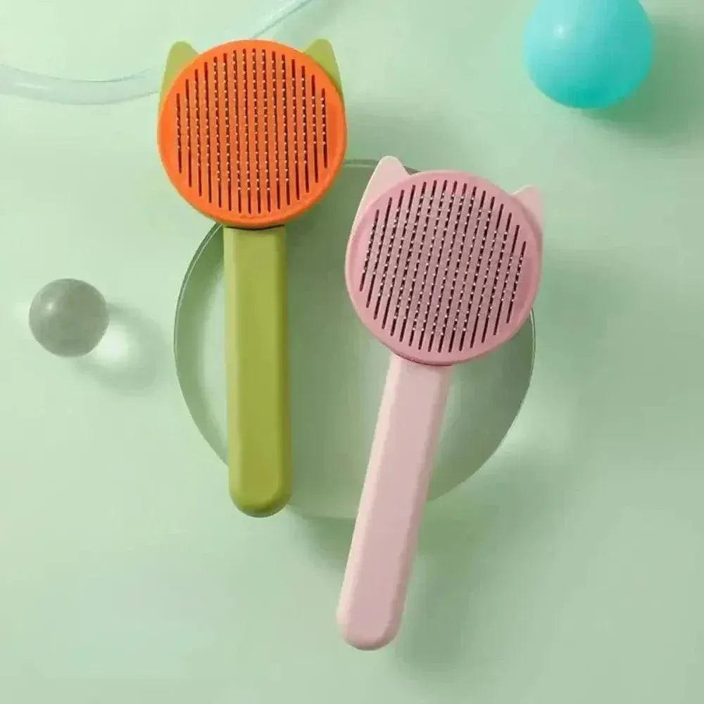 Self-cleaning cat brush